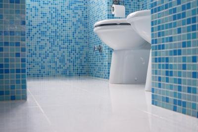 Ceramic is preferred in high-moisture-areas like bathrooms and kitchens.
