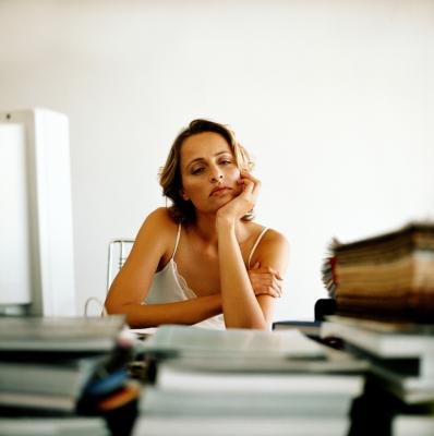 Woman having a slow day in the office