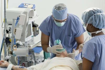 doctor preparing patient for surgery