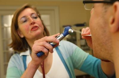 Family doctor with patient