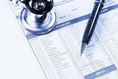 Close up of health insurance form and pen. Close up of health insurance form and pen.