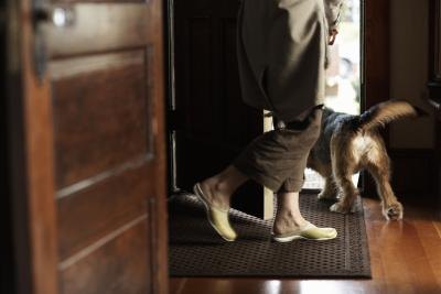 Woman taking dog for walk