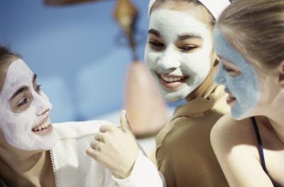 Girlfriends wearing a facial mask