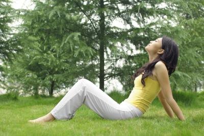 woman taking deep breaths