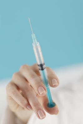 Nurse holding syringe