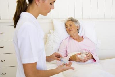 Nurse administering medication