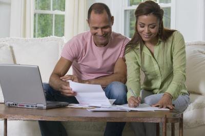 couple researching on computer