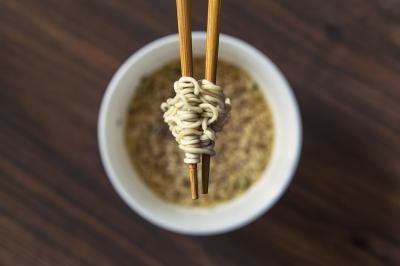 Chopsticks holding ramen noodles Chopsticks holding ramen noodles