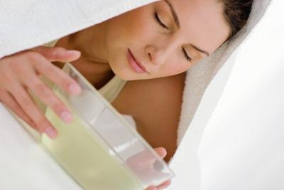 Woman breathing over treatment