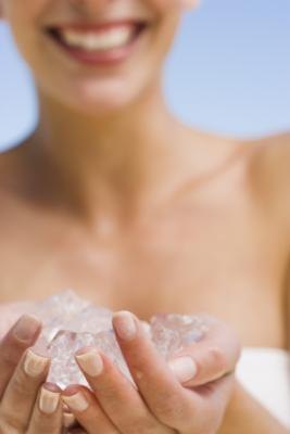 Woman with ice in hands