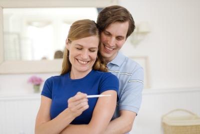 couple reading pregnancy test