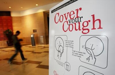 Government poster urging others to prevent the spread of the flu