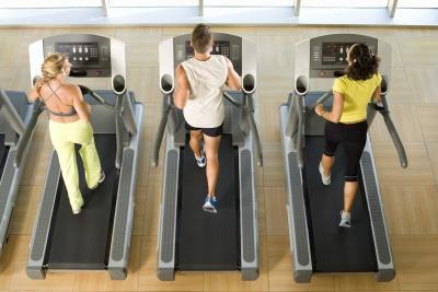 people on treadmills at gym