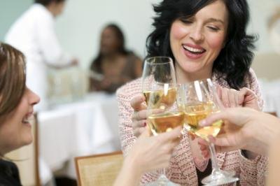 woman drinking white wine