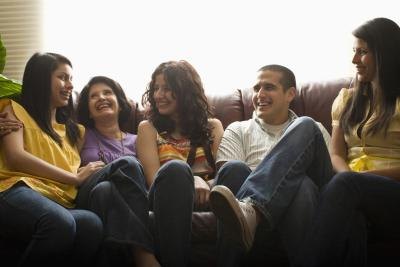 Family sitting on couch