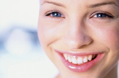 A close-up of a young woman smiling A close-up of a young woman smiling