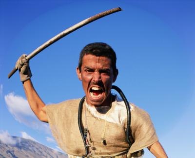 Aggressive man holding metal pipe