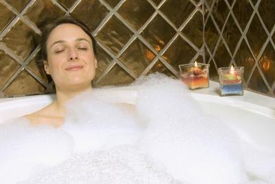 Relaxing in a hot bath can help sooth muscles and reduces stiffness in joints.