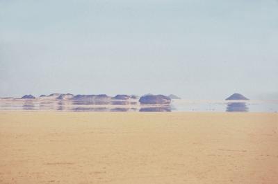 A desert is a vast expanse of sand. A desert is a vast expanse of sand.