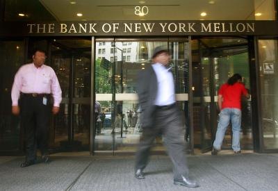 Customers walking out of The Bank of New York Mellon Customers walking out of The Bank of New York Mellon