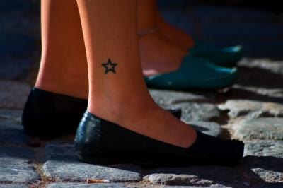 uncovred tattoo on ankle