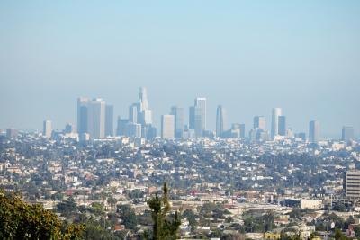 Downtown Los Angeles is barely visible though a thick layer of pollution.