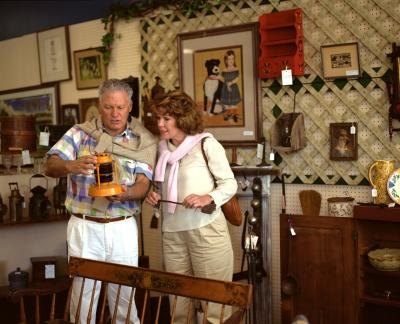 Mature couple in antique store.