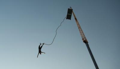 Man bungee jumping
