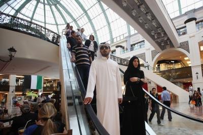 Man and woman inside the "Mall of the Emirates" in Dubai, United Arab Emirates