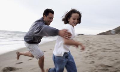 Father and son playing tag