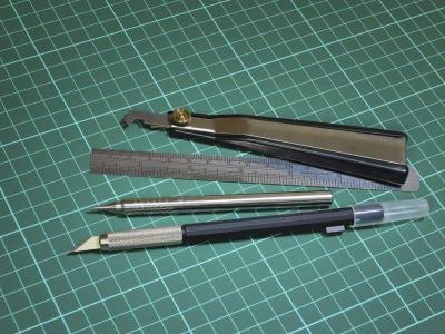 Cut the plastic to size using scissors or a razor knife.
