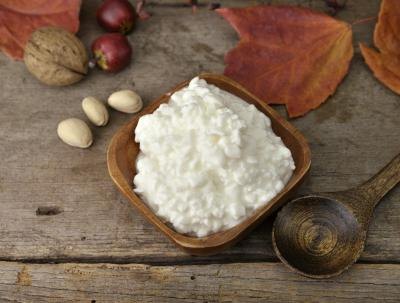 Cottage cheese in wood bowl