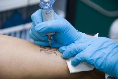 Difference Between a Liner & a Shader Tattoo Machine | eHow