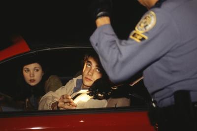 Teenagers talking to Police Officer