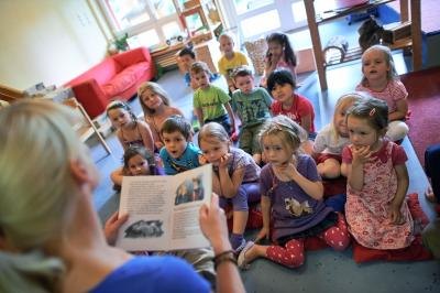Teacher reading to classroom