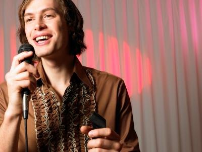 Man doing improv on stage