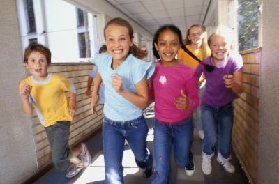 Kids running at school