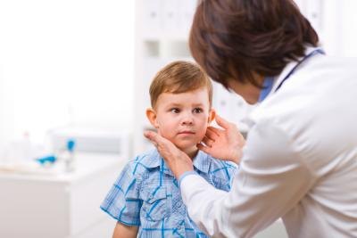Doctor checking toddler