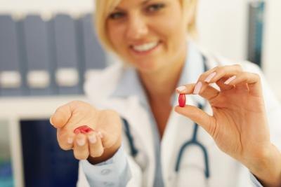 Doctor holds antibiotic