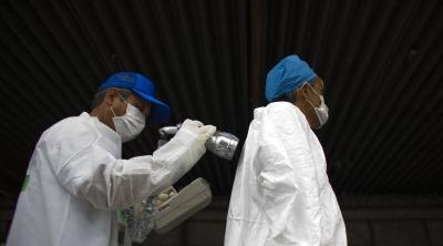 Man being screened for radiation who lives near the damaged Fukushima Nuclear Plant in Japan.