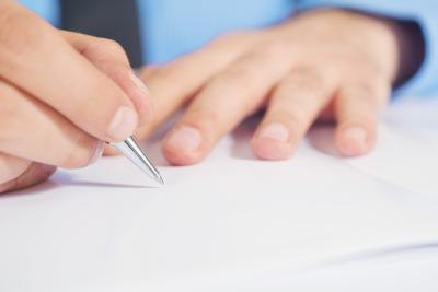Man filling out form