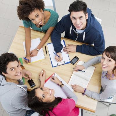 Smiling students in class. Smiling students in class.