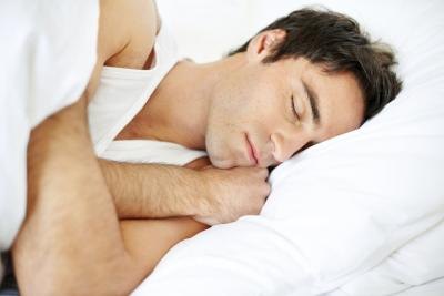 man resting in bed