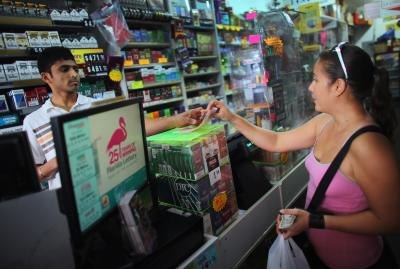 Woman buying lottery ticket in Hollywood, Florida