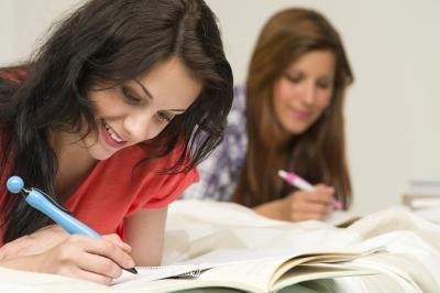 girls writing at boarding school