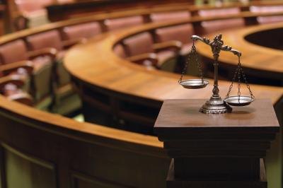 Scales of justice in court house