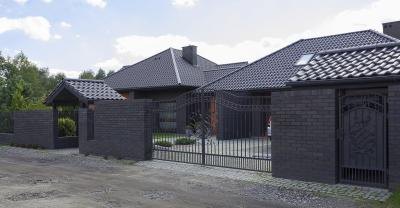 A dark house with a gray roof can look sleek and modern/