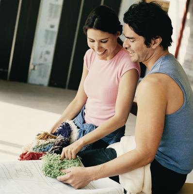 Couple looking at carpet