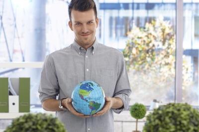 lead teacher holding world globe lead teacher holding world globe