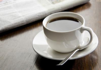 A cup of black coffee.